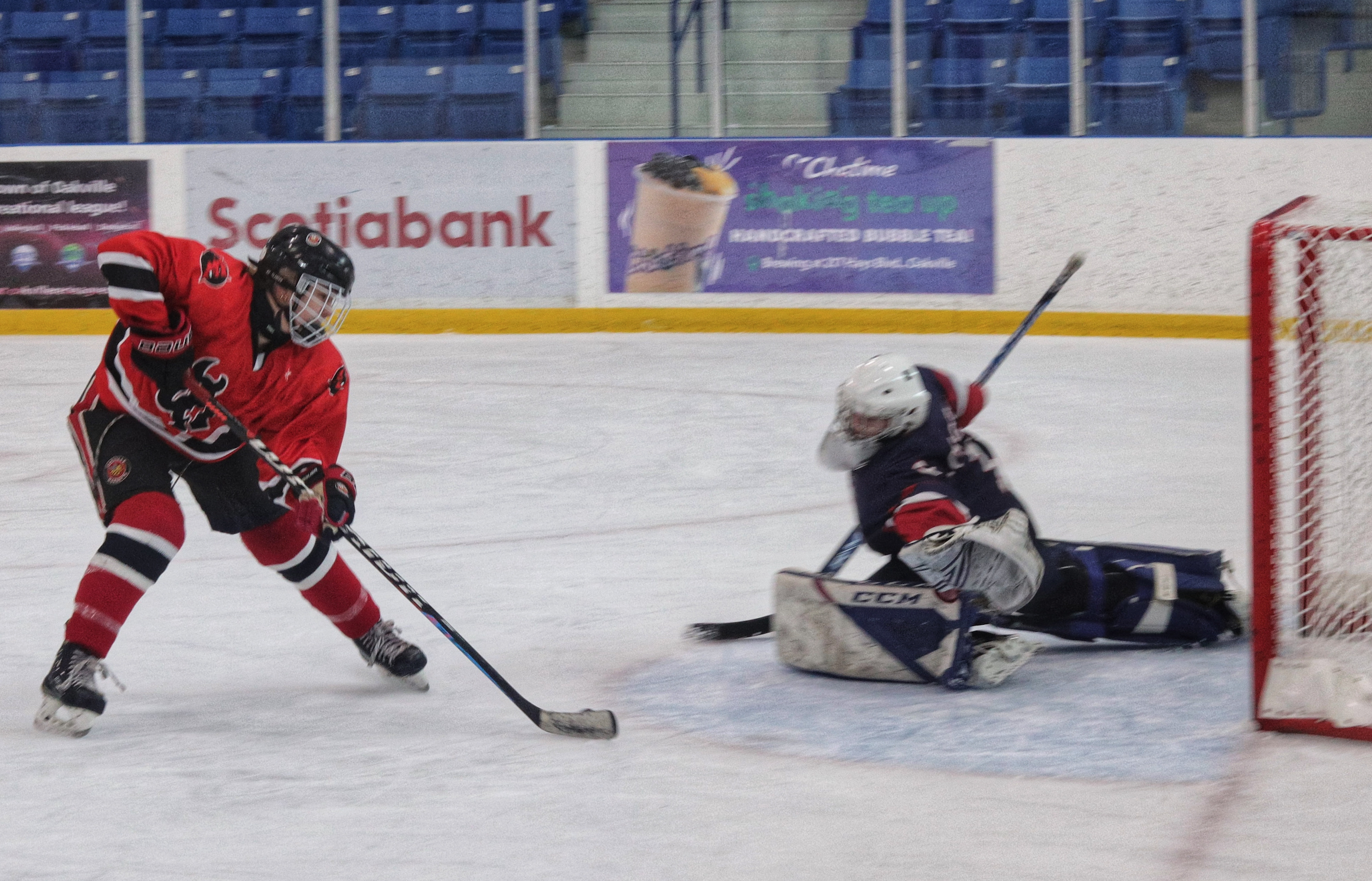 Ashely Oswald buries the back hand. | Ashely Oswald made no mistake on her breakaway opportunity and gave OT the HSSAA Varsity Girls Championship | Pierce Lang